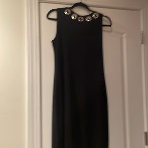 Dress with silver rivets in front and back neckline